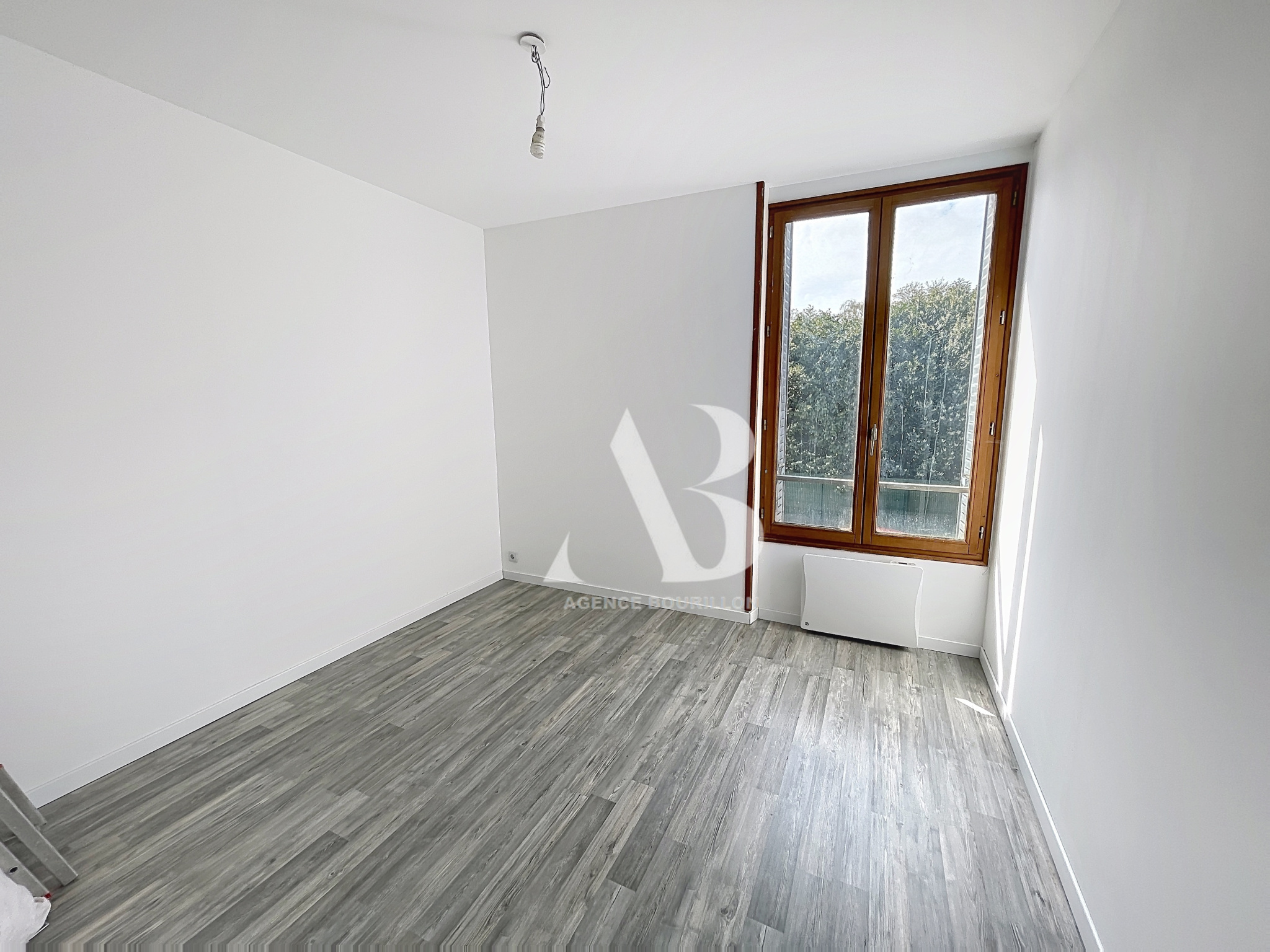 Appartement de type 3 avec jardin à GUIGNES